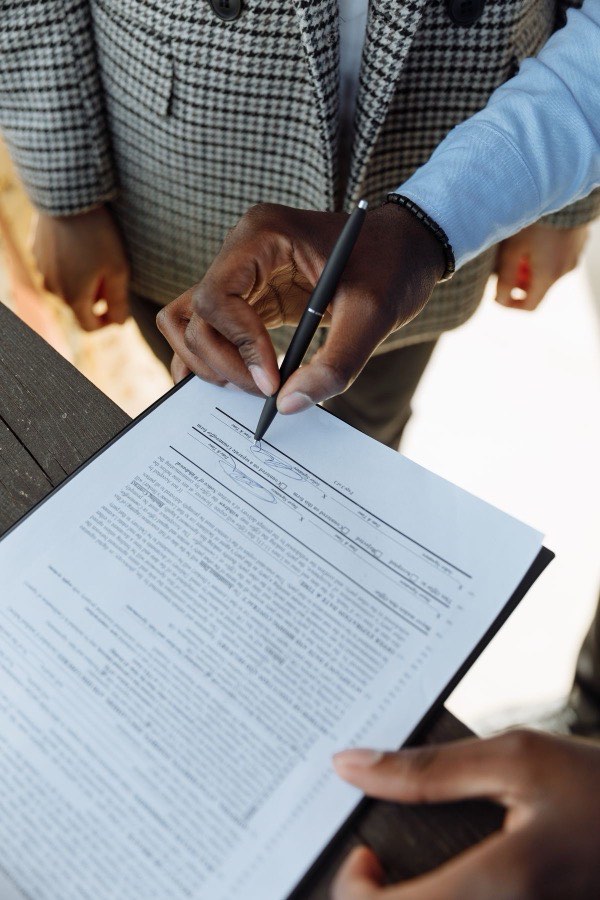 Person signing an enrollment document